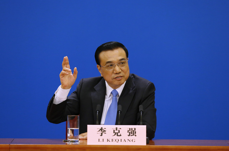 3月15日，國務院總理李克強在北京人民大會堂與中外記者見面，并回答記者提問。 新華社記者 沈伯韓 攝