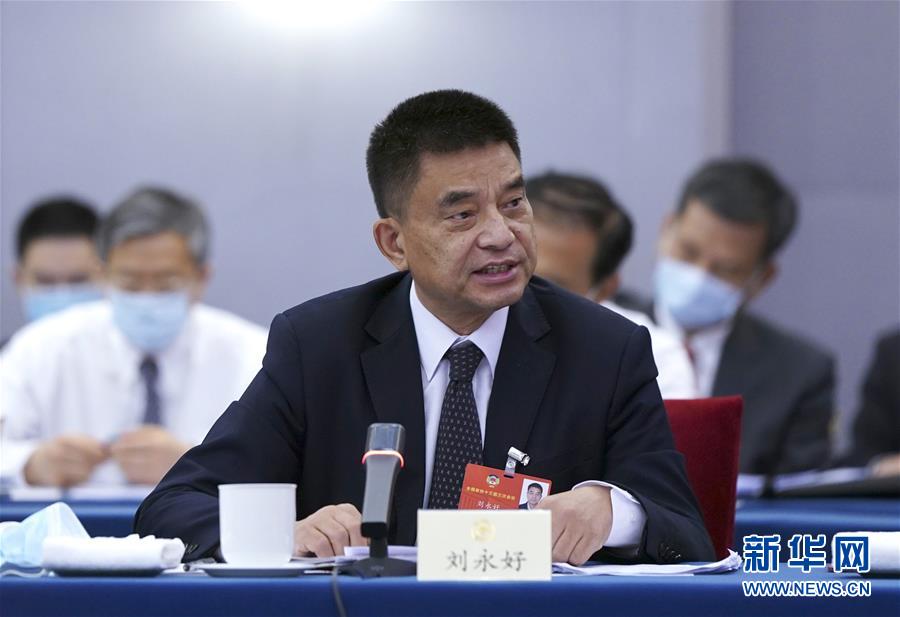 （兩會&middot;熱點畫報）（3）代表委員建言統籌做好經濟社會發展工作