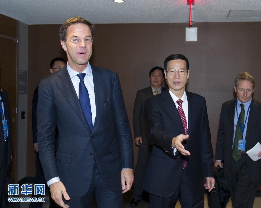 9月23日，出席聯(lián)合國氣候峰會的國家主席習(xí)近平特使、國務(wù)院副總理張高麗在紐約聯(lián)合國總部會見荷蘭首相呂特。 新華社記者 王曄 攝 