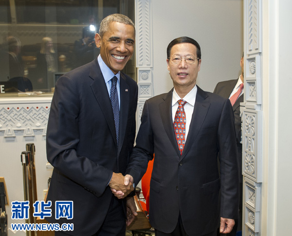 9月23日，國家主席習(xí)近平特使、國務(wù)院副總理張高麗在紐約會見出席聯(lián)合國氣候峰會的美國總統(tǒng)奧巴馬。 新華社記者王曄攝