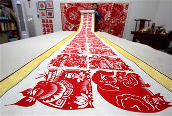 &ldquo;百豬&rdquo;剪紙迎新春